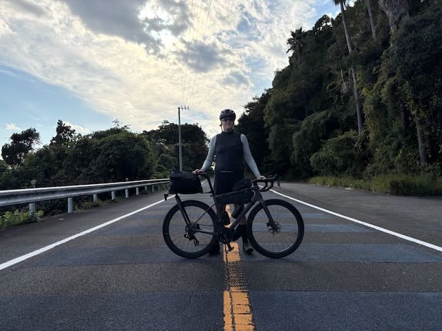 Me posing on the street with my bike